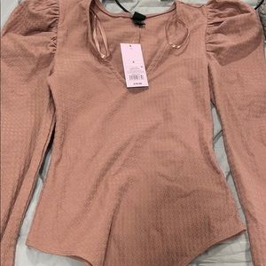 Cute pinky nude colored bodysuit